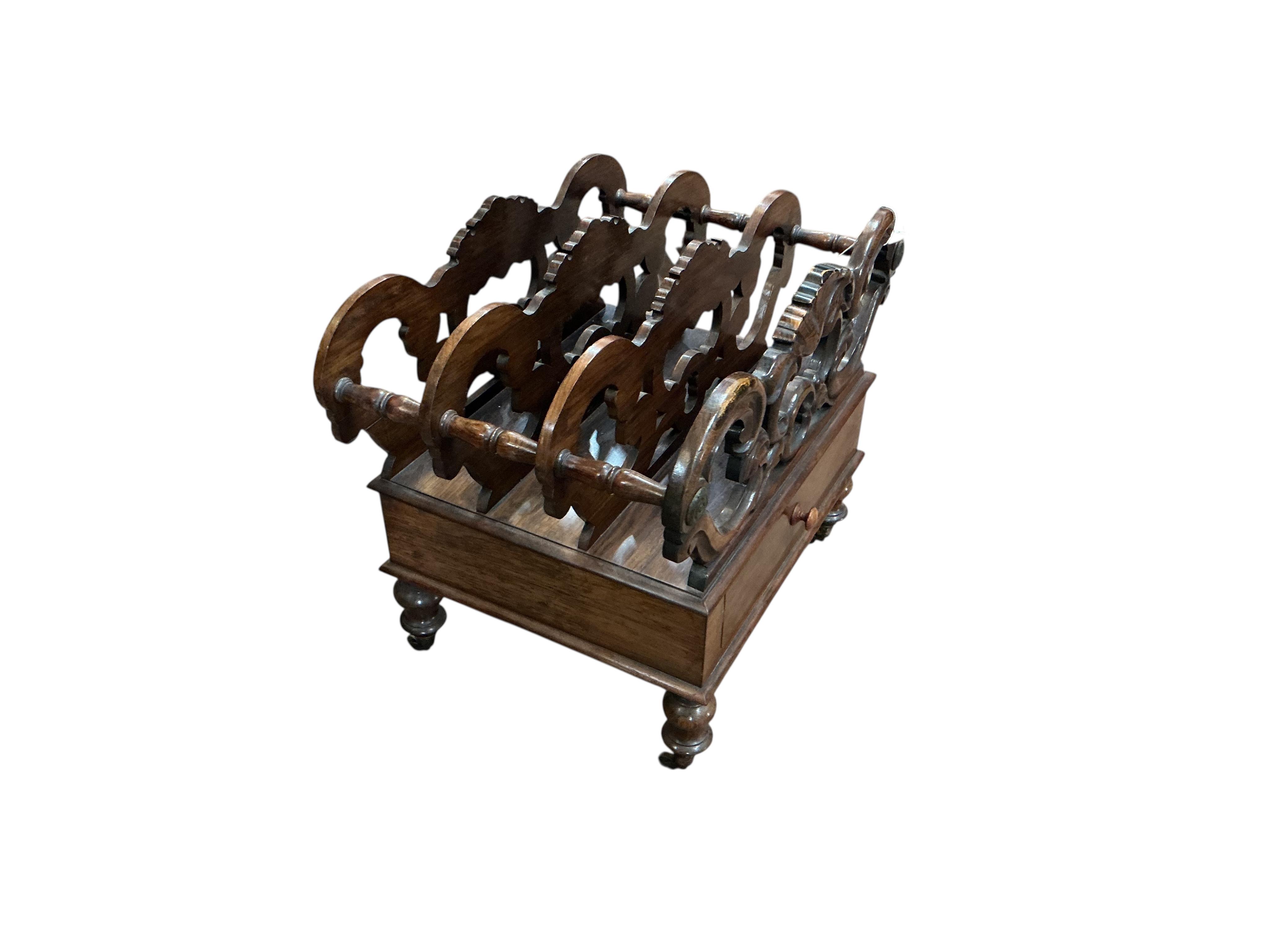 A Victorian rosewood three division Canterbury, width 54cm, depth 36cm, height 46cm